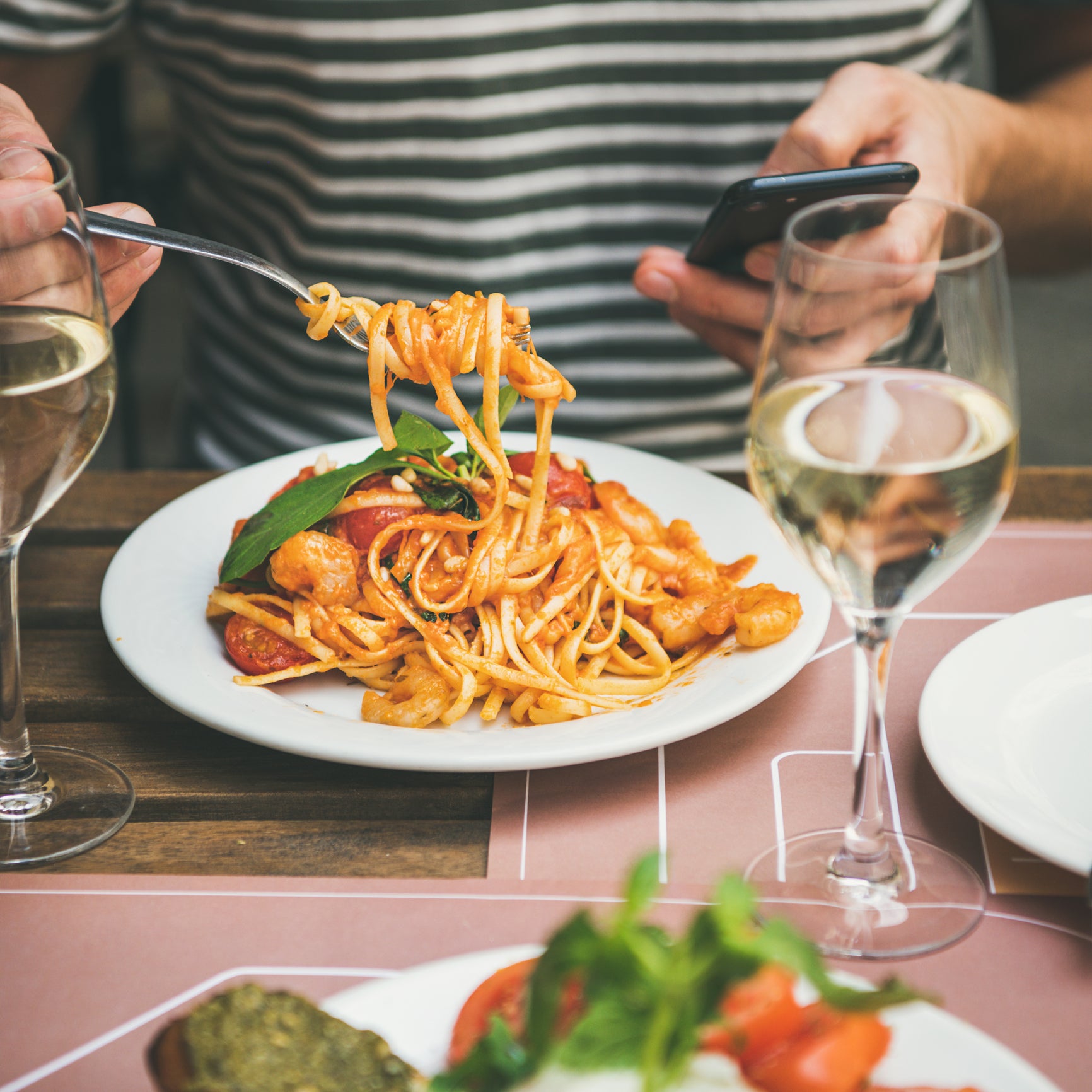 Seafood for Two - A Romantic Dinner Table Setting with Shrimp Scampi and Lobster Tails